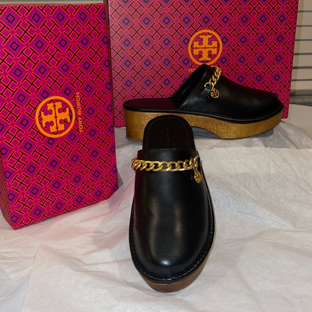 Tory Birch clogged black with gold tone, hardware tan bottom leather upper.